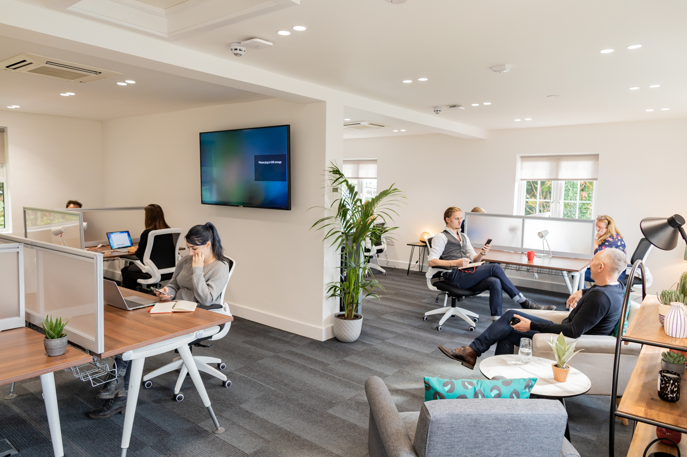People working inside the former Circa45 Mill House workspace